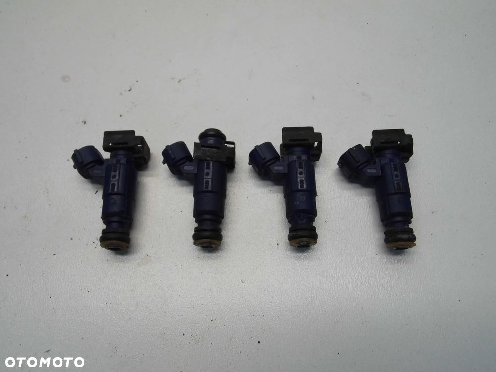 WTRYSKIWACZ PALIWA 35310-2B000 KIA VENGA CEED I LIFT 1.4 1.6 16V BENZYNA ORYGINAŁ