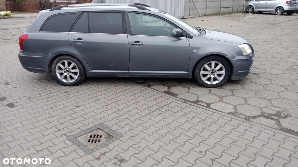 Avensis T25 1.8 16v czesci 1E5 zderzak maska blotnik drzwi klapa - 1
