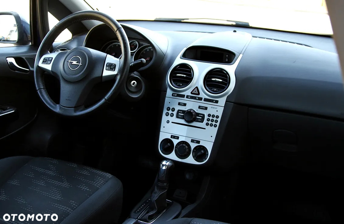 Opel Corsa 1.4 16V Enjoy - 32