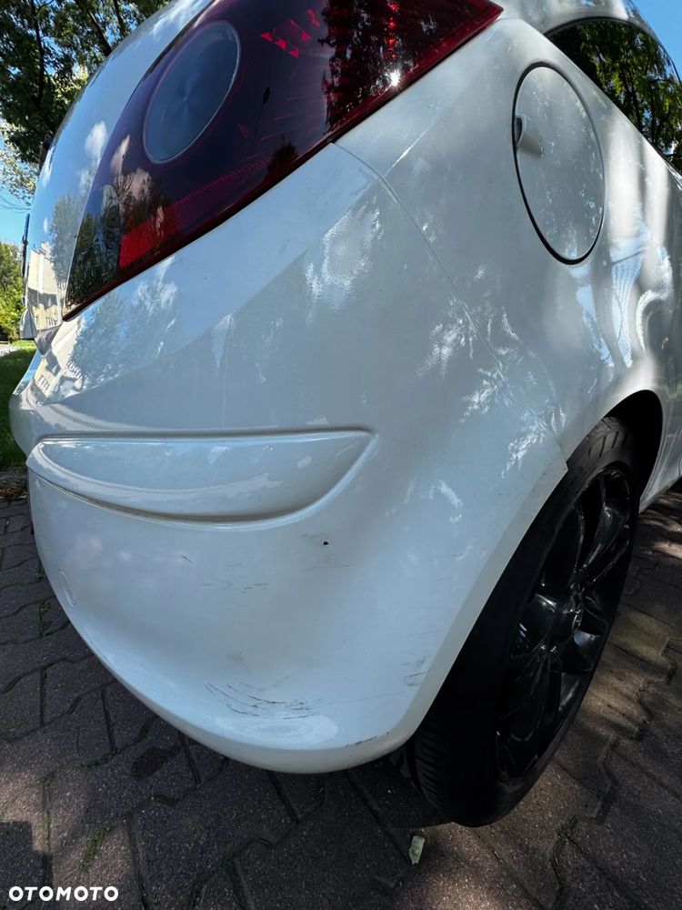 Opel Corsa 1.4 16V Sport - 11