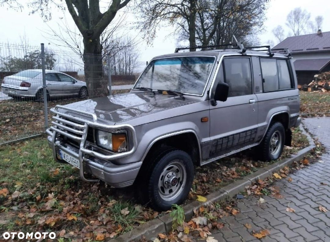 Części isuzu trooper I silnik 2.6 benzyna skrzynia automat maska drzwi - 2