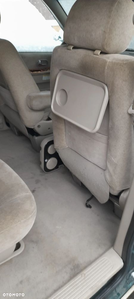 blotnik prawy lampa  Kia Carnival I  99-06r - 9