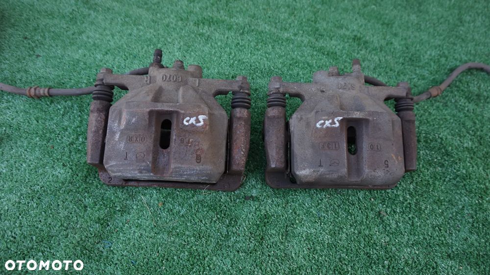 Mazda CX-5 CX5 2.2D zacisk hamulcowy jarzmo lewy prawy przod