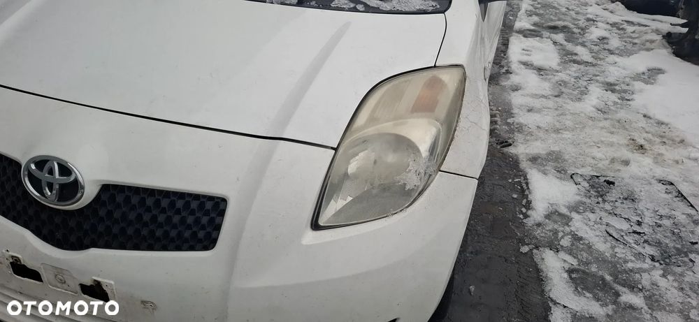 YARIS II 06-09 lampa przednia lewa REFLEKTOR EU - 1
