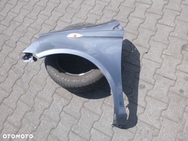 BŁOTNIK LEWY PRZÓD LEWY PRZEDNI TOYOTA YARIS I LIFT KOLOR 855 - 2