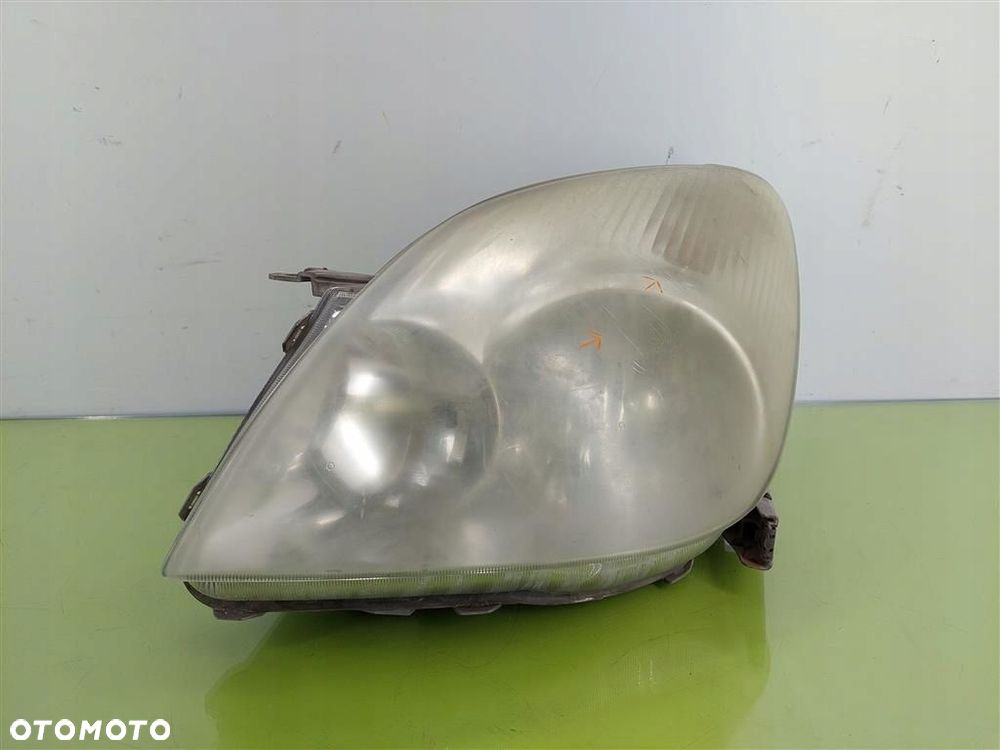 Reflektor lampa przód lewa Toyota Corolla Verso I 2001-2004 UPM60GF20 - 1