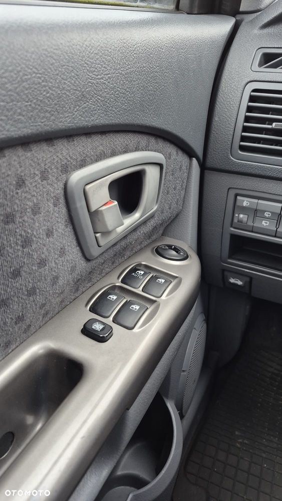 Kia Carens 2.0 CRDi EX - 13