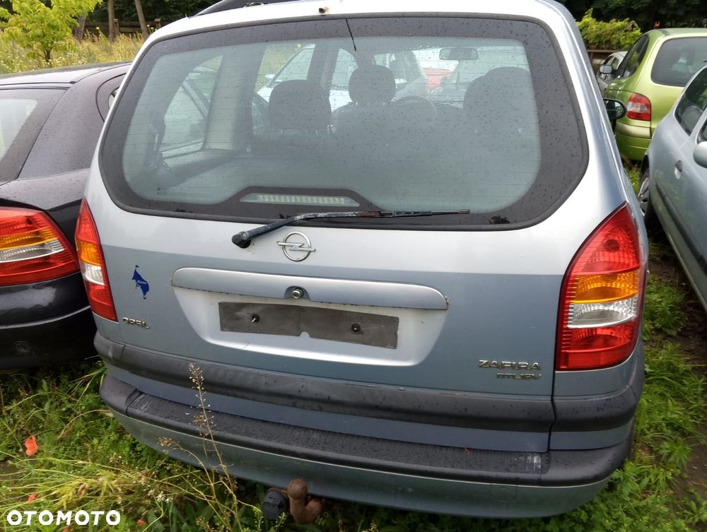 Opel Zafira A (99-03r.) 2.0 DTI 100KM. Silnik Y20DTH Skrzynia F23 WR lakier Z 151 / 94L.Cały na części.GWARANCJA !!! Przód Tył Zestaw Komplet Drzwi Klapa Zderzak Błotnik Maska Grill Atrapa Szyba Pas Lampa Lusterko Boczki Fotel Kanapa Kokpit Deska Rozdzielcza Przełącznik Włącznik Sterownik Przewody Wiązka Instalacja Moduł Komputer Czujnik Listwa Pompa Alternator Wtryski Głowica Rozrusznik Kompresor Sprzęgło Dwumas Silnik Skrzynia ABS Klimatyzacji Paliwa Wspomagania Kolektor Turbina Przepustnica Zawór Chłodnica Koło Hak Belka Sanki Zawieszenie Mcpherson Półoś Amortyzator Wydech Tłumik Zacisk Most - 4