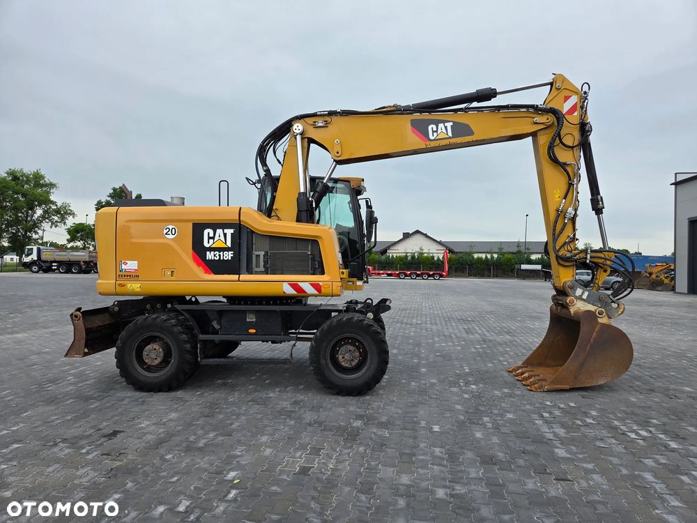 Caterpillar M318F / z Niemiec / - 5
