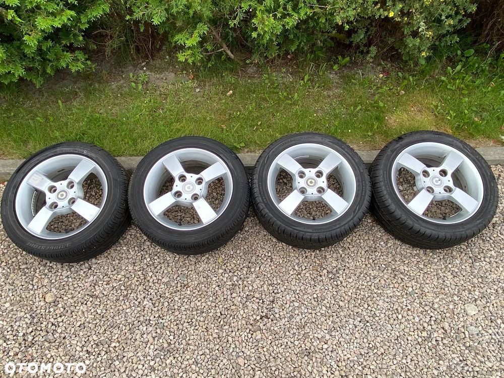 SMART Alufelgi 15" 4x114,3 15x6J z oponami 195/50/15