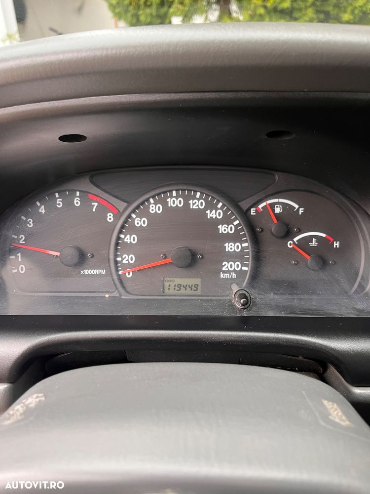 Suzuki Grand Vitara 2.0 - 7
