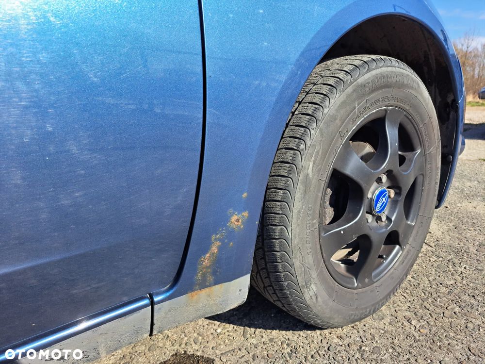 Subaru Impreza 1.5 RA - 11