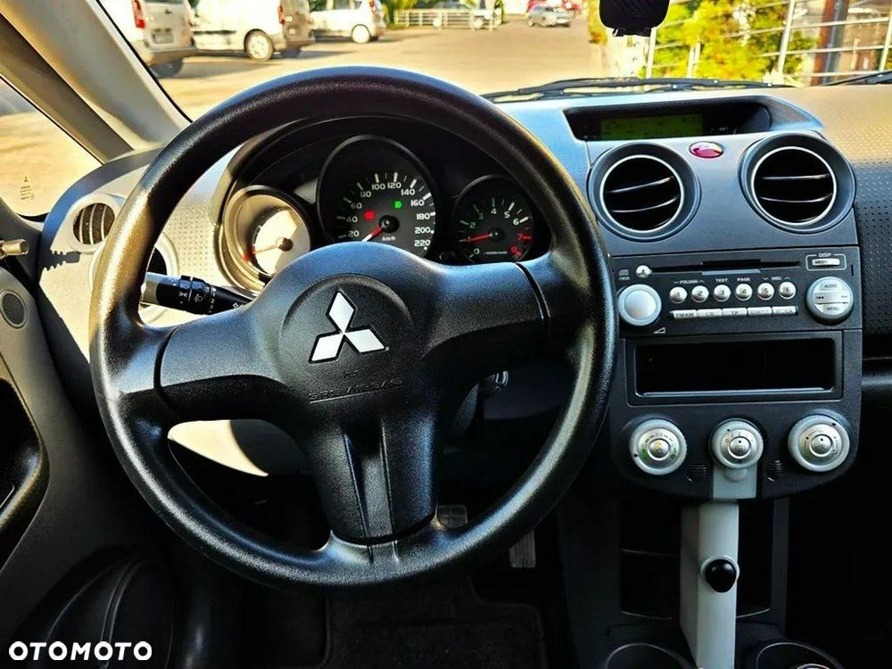 Mitsubishi Colt 1.1 - 12