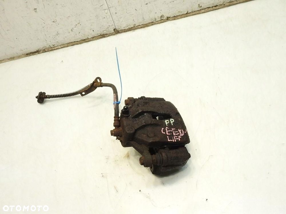 ZACISK HAMULCOWY PRAWY PRZÓD KIA CEED I 1.6 CRDI - 6