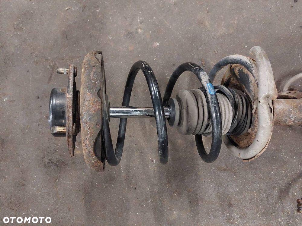 AMORTYZATOR SPRĘŻYNA ZWROTNICA LEWY PRAWY PRZÓD NISSAN ALMERA TINO 2.2 - 4