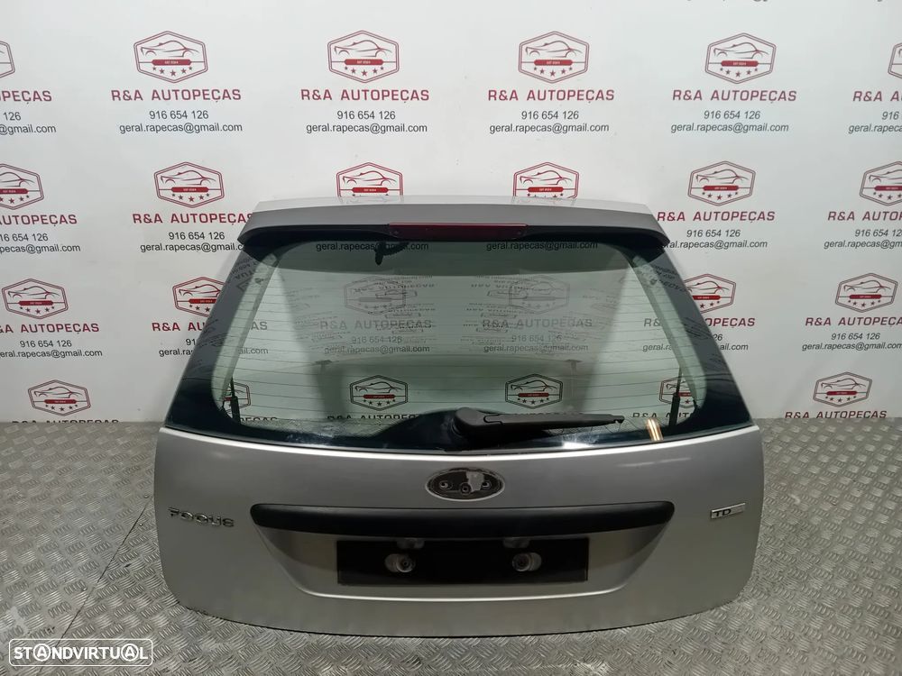 Tampa da Mala Ford Focus II Original - 1