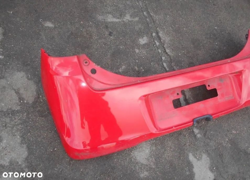 Zderzak tylny tył Daihatsu Cuore VII L276 2009r 5d hatchback R40 - 2