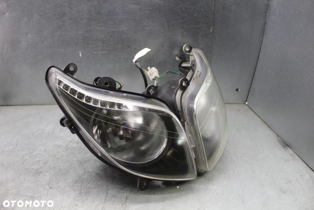 Sym GTS 125 Evo FI 09r Lampa przód przednia reflektor lewy prawy komplet - 3