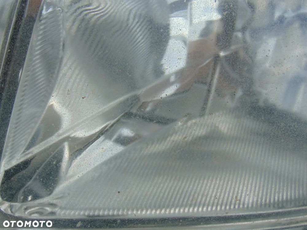 Lampa przednia przód lewa VW Transporter Caravelle T5 - 12