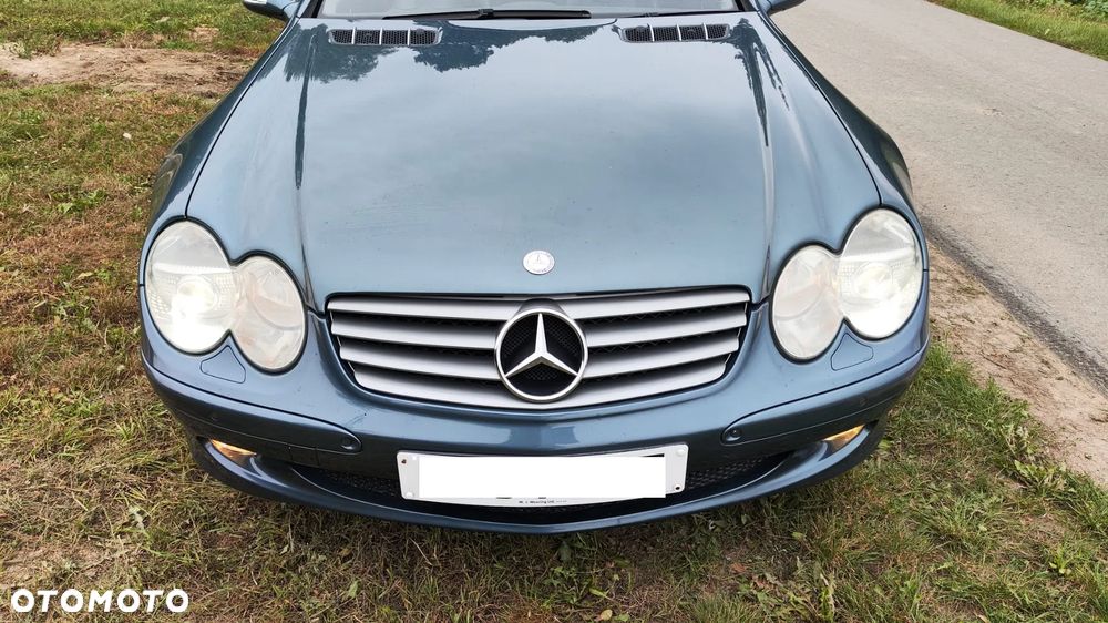 MASKA ZDERZAK ATRAPA GRILL BŁOTNIK LEWY PRAWY PAS PRZEDNI WZMOCNIENIE CHŁODNICE WENTYLATOR SPRYSKIWACZE LAMPY BI-XENON XENON PRZÓD KOMPLETNY ORYGINALNY LAKIER C946 946 DO ZAŁOŻENIA W KOLOR MERCEDES SL R230 W230 SL500 - 1