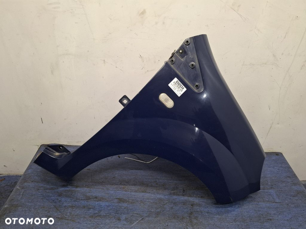RENAULT TWINGO II BŁOTNIK PRZÓD PRAWY   DV460