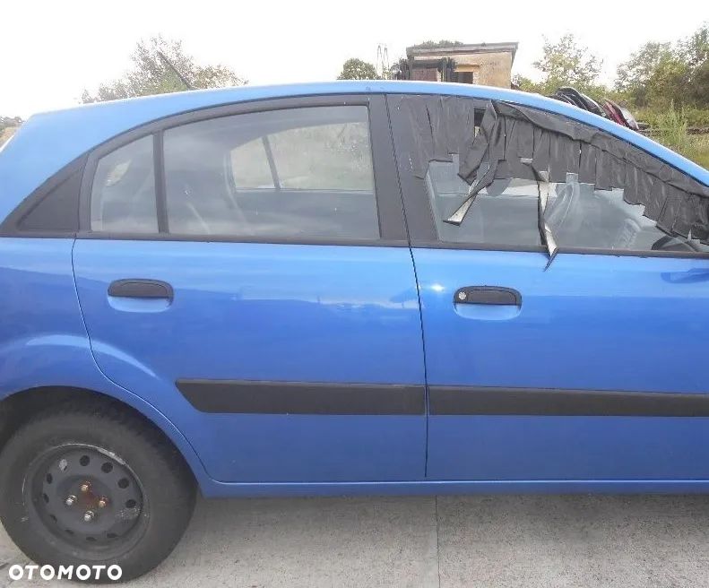 Drzwi prawe tylne tył Kia Rio II Lift 2009r 5d hatchback T5 - 1