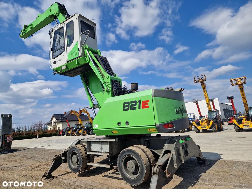 Sennebogen 821E jak FUCHS CAT M500 - 8