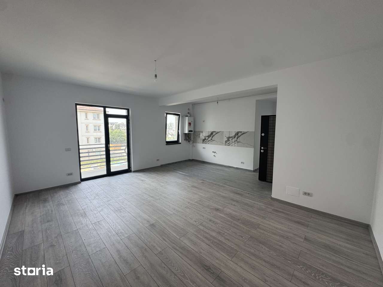 Apartament 2 camere open-space, finisaje premium, parcare inclusa — fotografia 1