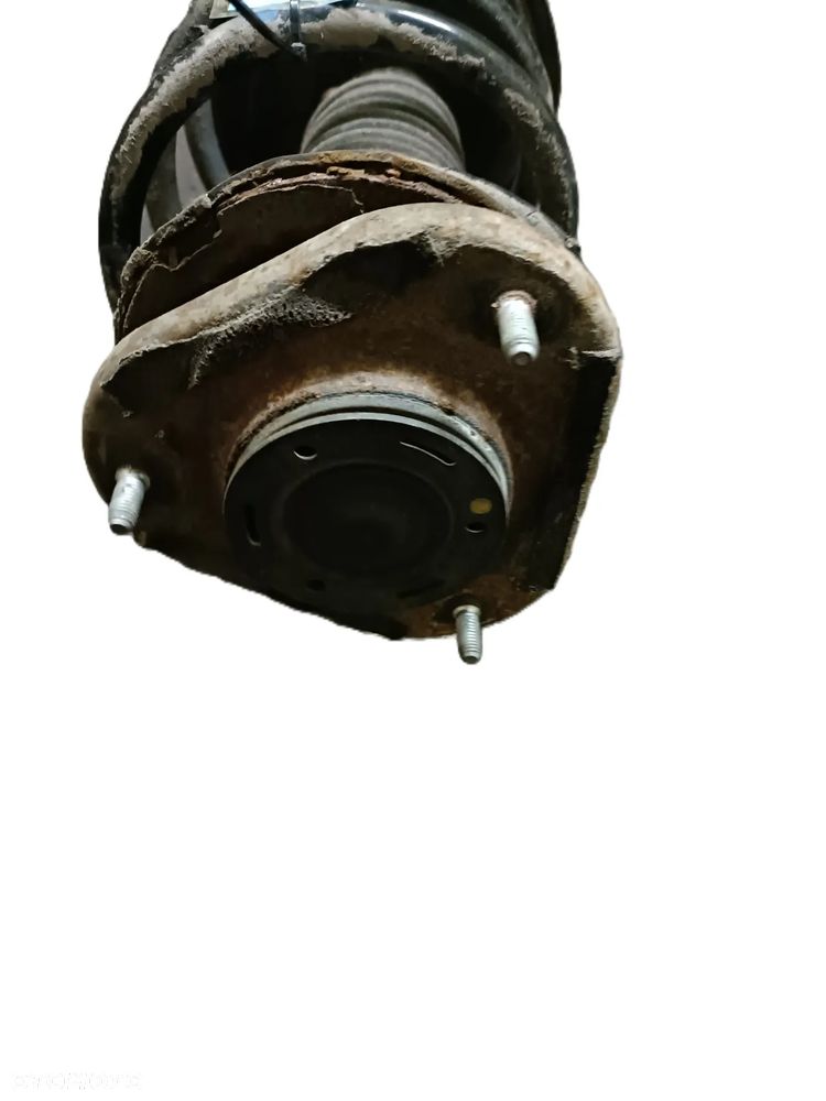 TOYOTA AVENSIS T25 03-09 2,0 D4D amortyzator lewy przód LP * - 3