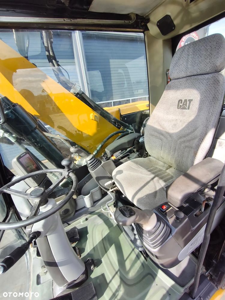 Caterpillar M315D - 11