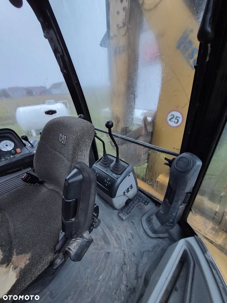 Caterpillar 428E - 7