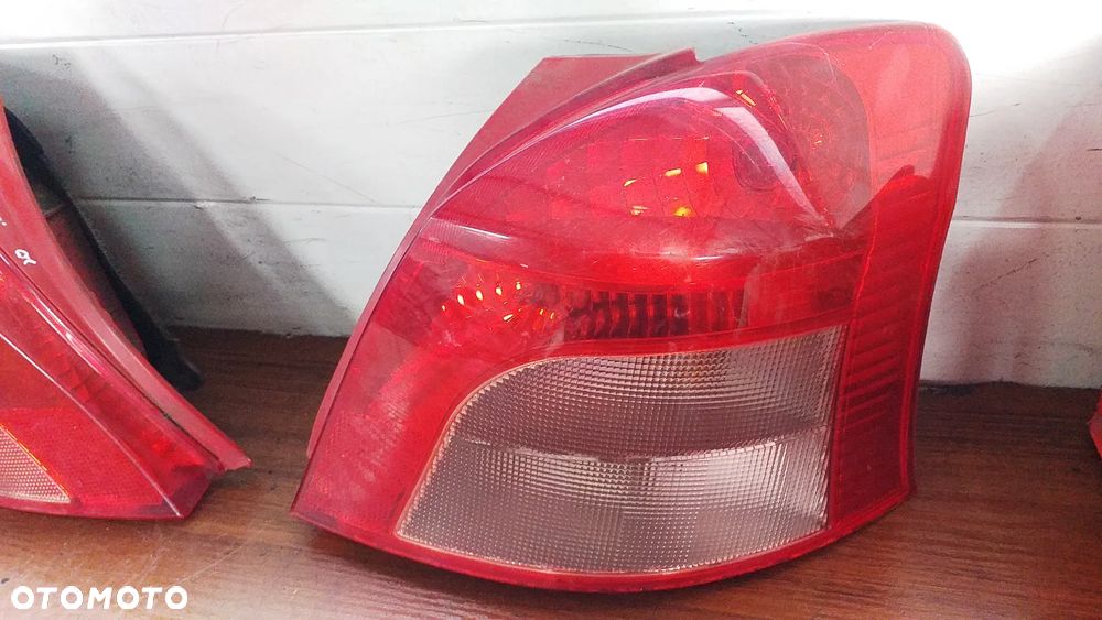 Lampa lewy prawy przód tył Toyota Yaris II 5D - 12