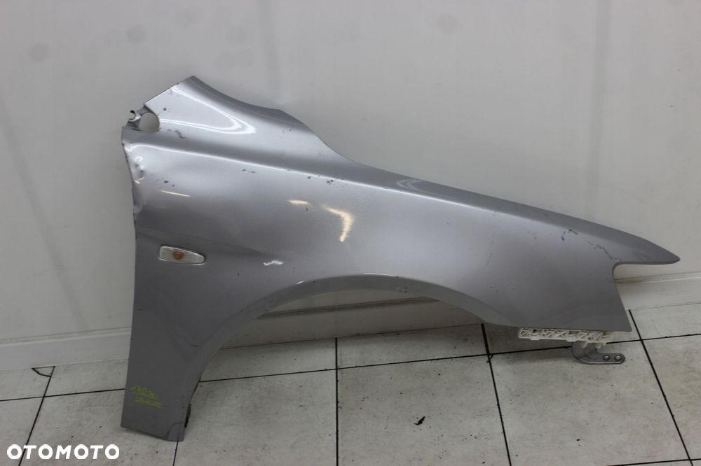 MITSUBISHI LANCER VIII 07R- BŁOTNIK PRAWY PRZÓD PRZEDNI A31B - 1