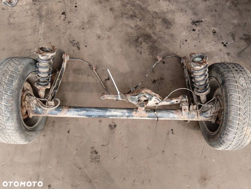 OŚ BELKA TYLNA WLECZONA + KOŁA (IDEALNA NA PRZYCZEPE) NISSAN PRIMERA P11 - 2