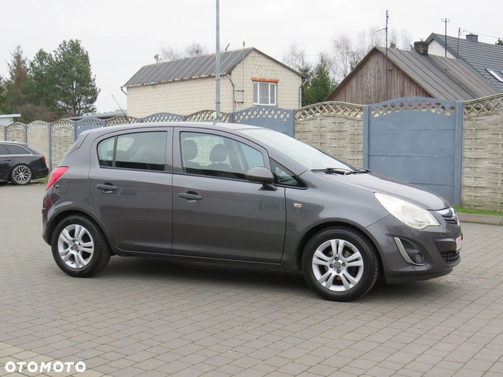 Opel Corsa 1.2 16V Cosmo - 11