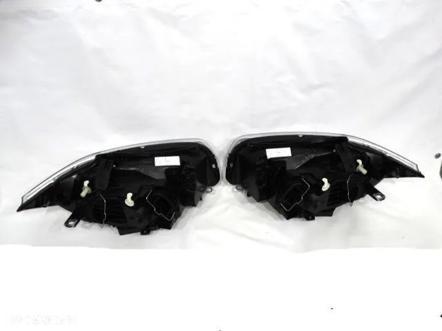 BMW E87 Lampa  Europa Prawa Lewa Reflektor Nowa H7+H7  04-07 6924485 6924486 - 5