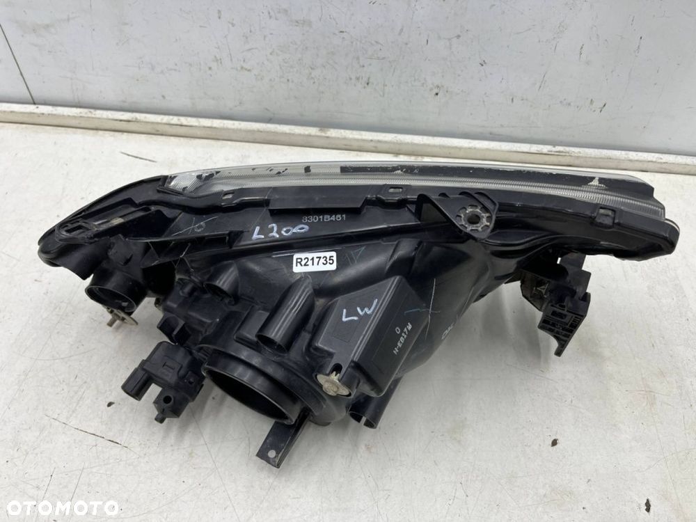 Lampa reflektor Mitsubishi L200 KA KB 05-10r. LEWA przednia H4 oryginalna lewy przód EU 8301b461 - 10