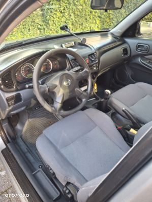 Nissan Almera 2004 photo 4