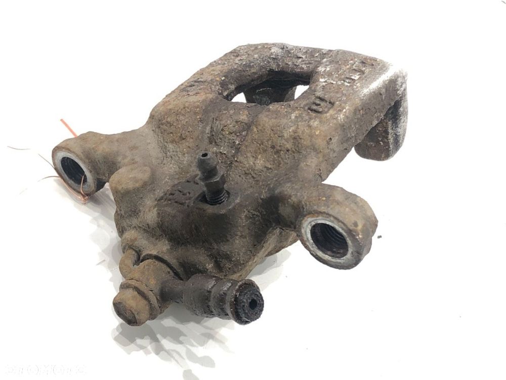 ZACISK LEWY TYŁ  NISSAN QASHQAI / QASHQAI +2 I (J10, NJ10, JJ10E) 2006 - 2014 2.0 104 kW [141 KM] - 2