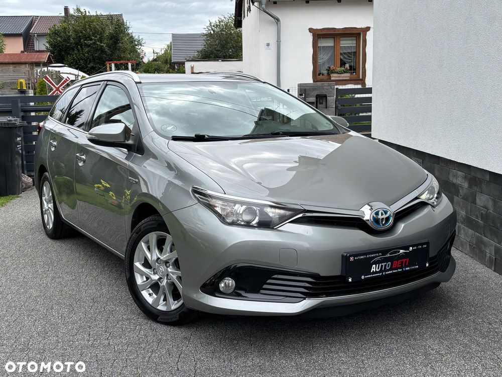 Toyota Auris 1.8 HSD Prestige NAVI - 1