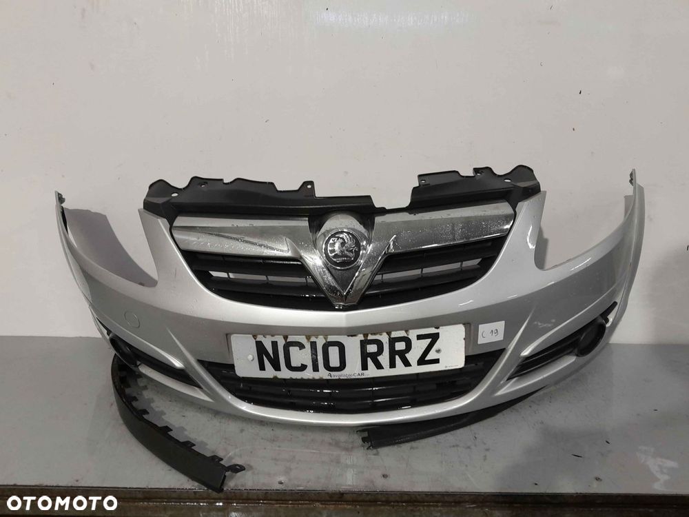 ^ ZDERZAK PRZÓD PRZEDNI OPEL CORSA D Z157 SREBRNY