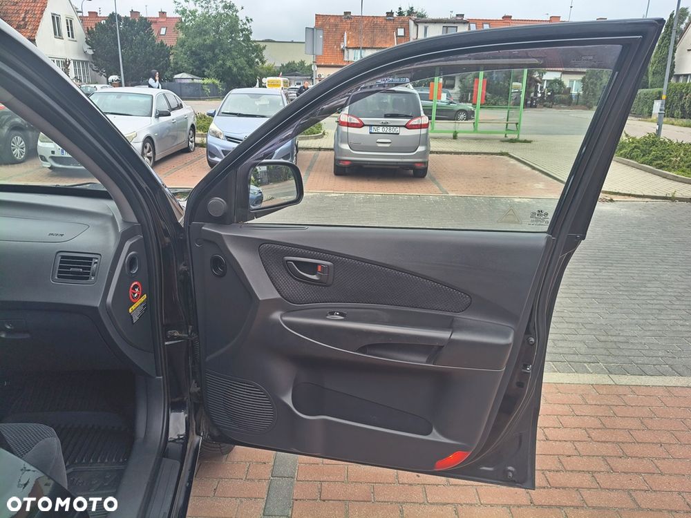 Hyundai Tucson 2.0 Comfort 2WD - 30