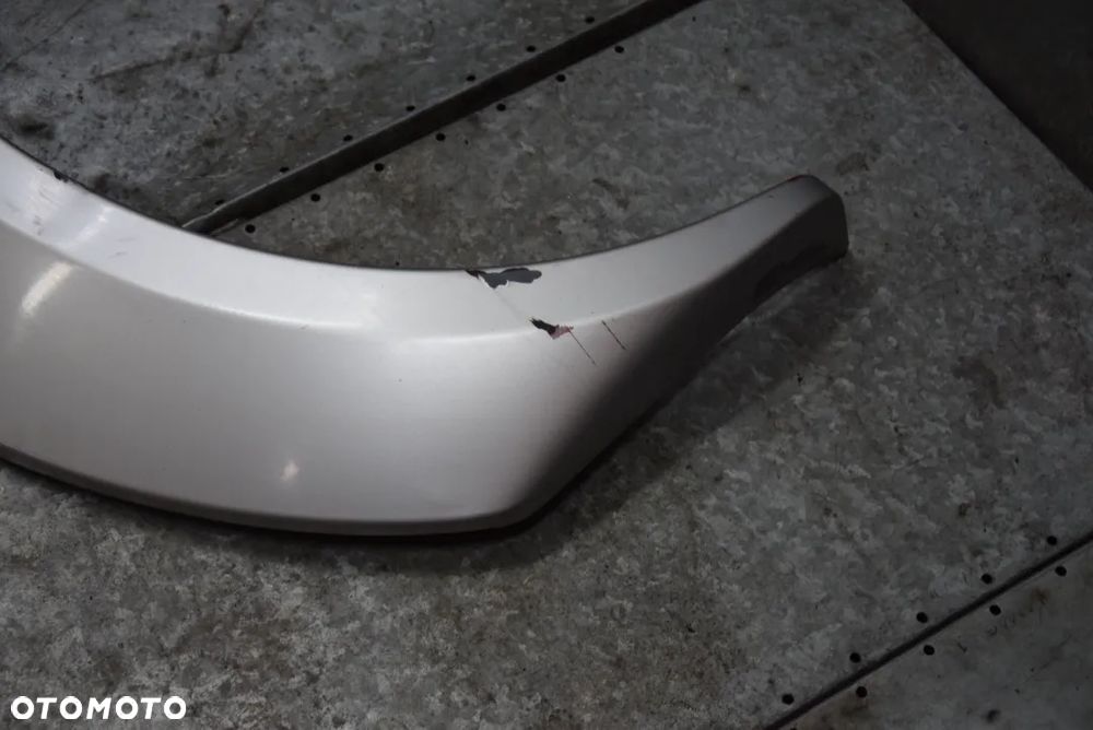 NISSAN NAVARA D22 LISTWA BŁOTNIKA LEWA  TYŁ 4D - 6