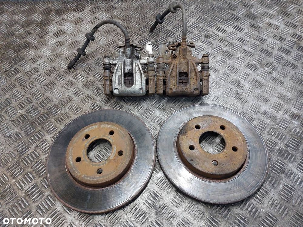 TARCZE HAMULCOWE TYŁ + KLOCKI + ZACISKI FORD MONDEO MK3 - 1