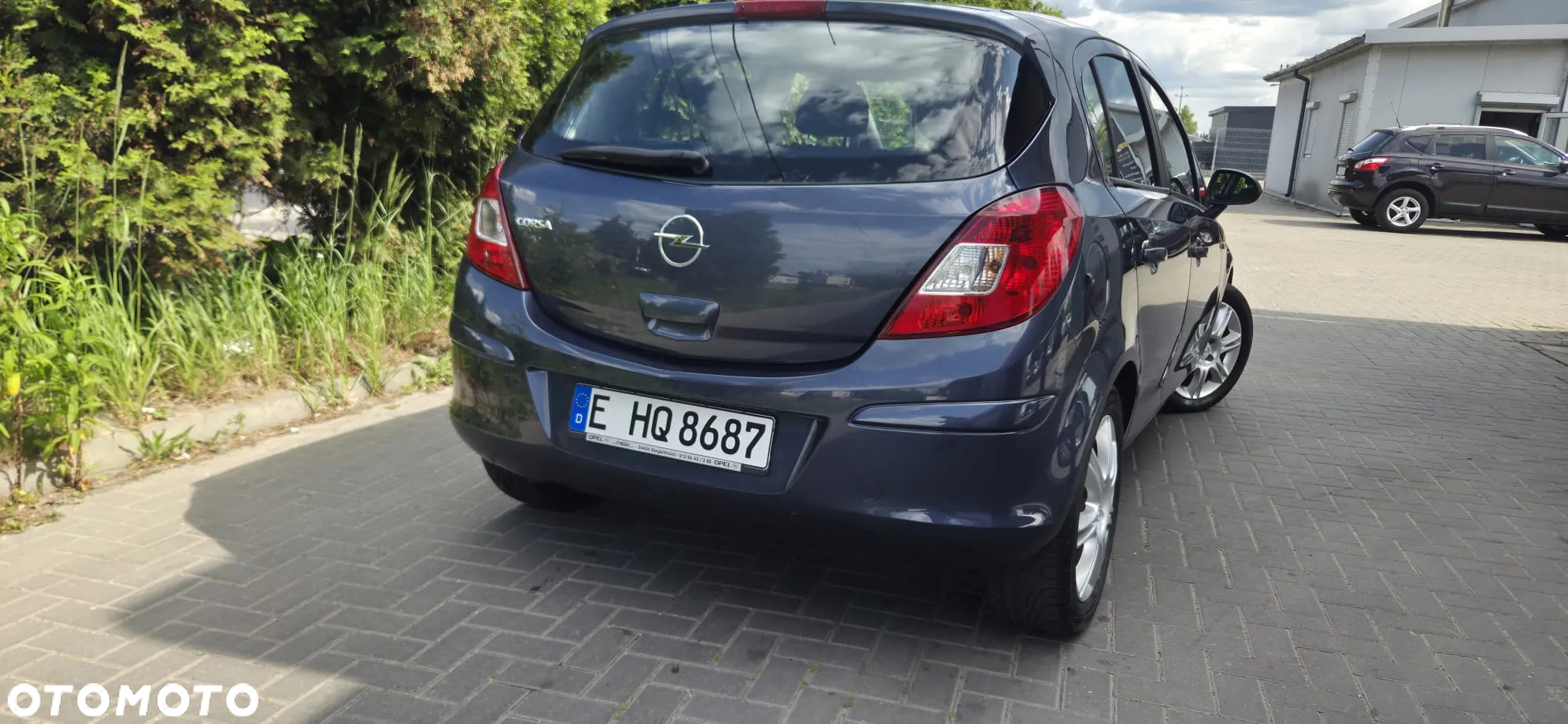 Opel Corsa 1.4 16V Cosmo - 15