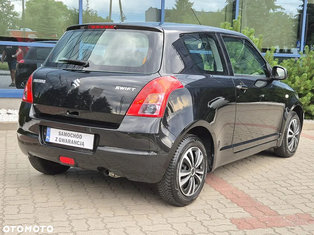 Suzuki Swift 1.3 Club - 4