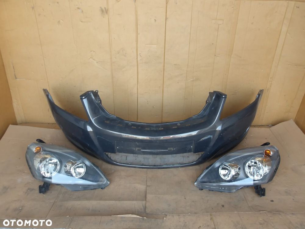 ZDERZAK PRZEDNI PRZOD OPEL ZAFIRA B LIFT 13247273 - 2