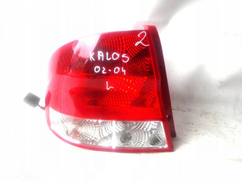 AVEO KALOS 02-04R SEDAN LAMPA TYŁ LEWA ORYG NOWA - 1