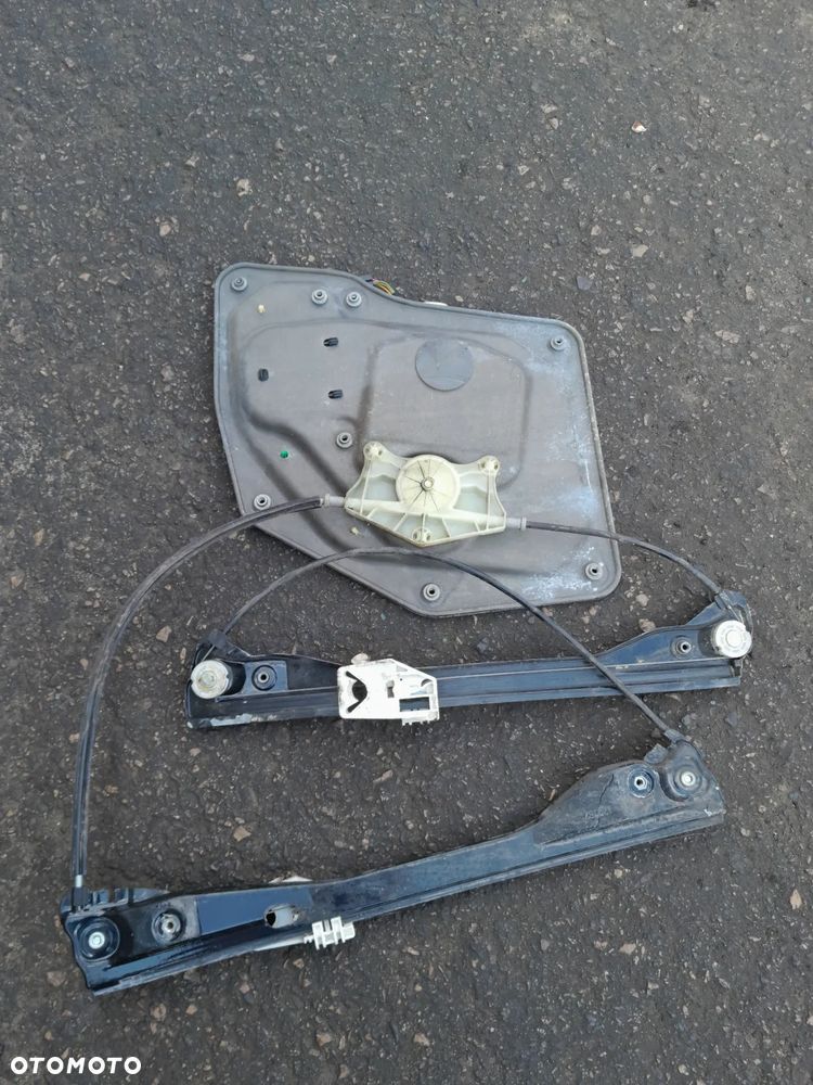 Podnośnik szyby przedni lewy SKODA Superb II 08-13r. 3T0837401A - 2
