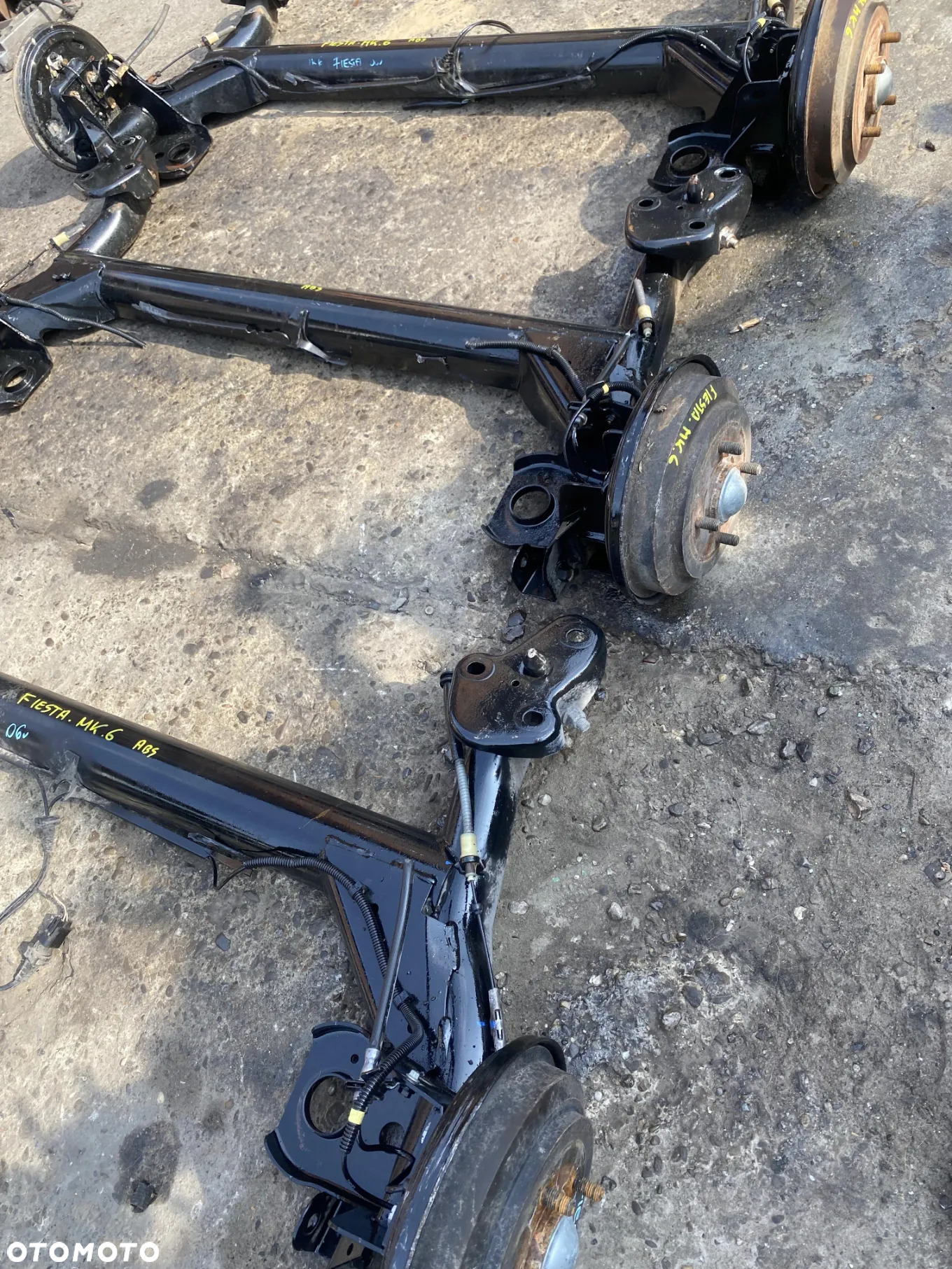 Belka tylna zawieszenia Ford Fiesta MK6 ABS 2002-08r. OE - 2